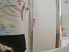 Voyeur Tapes A Girl On The Toilet And Taking A Shower
